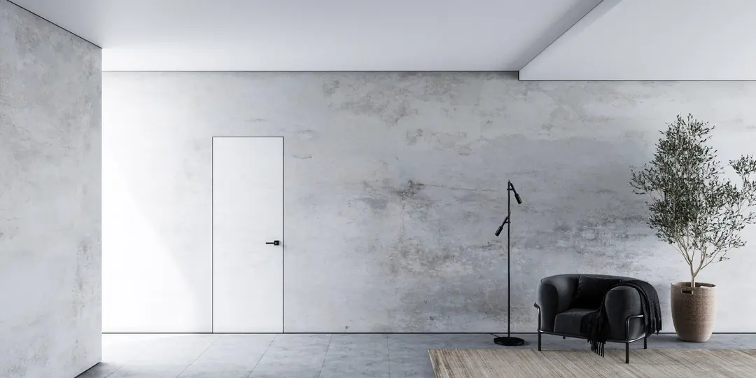 Efekt stínové spáry u stěny v minimalistickém interiéru